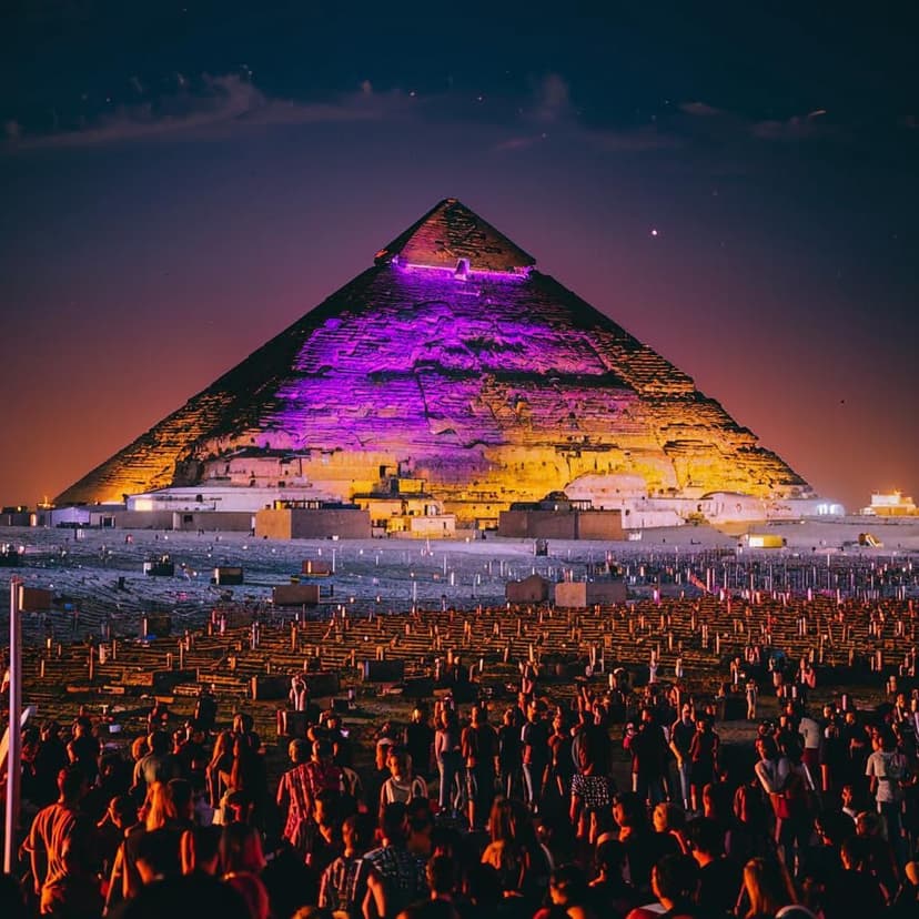 Illustration of a huge music festival at the foot of the pyramids